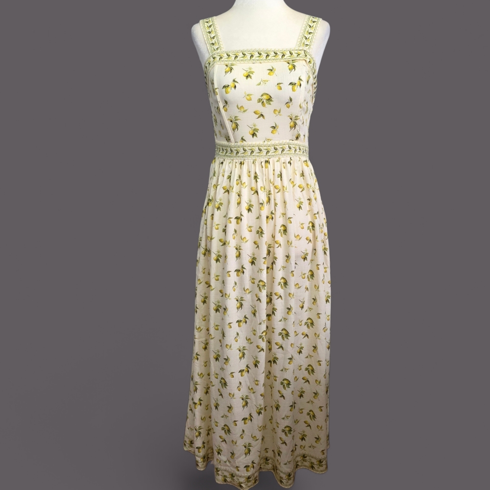 Sleeveless Cream Maxi Dress with Yellow Floral Print